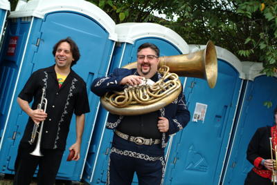 Rubin and London in front of port-a-potties