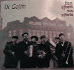 Album cover: Lovely old-fashioned shot of the band in front of steamship building.